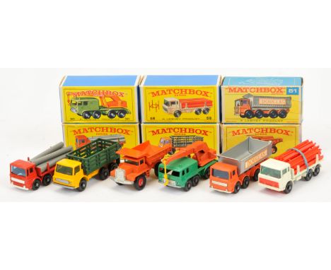 Matchbox Regular Wheels group (1) 4d Dodge Stake Truck (2) 10d Leyland Pipe Truck; (3) 28d Mack Dump Truck - orange body (4) 