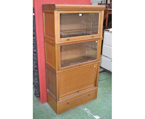 A Globe Wernicke style oak four section bookcase cabinet