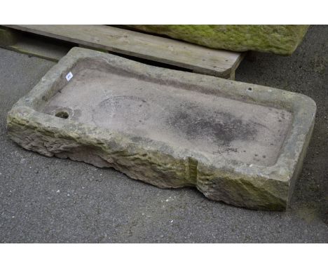 A shallow sandstone trough.