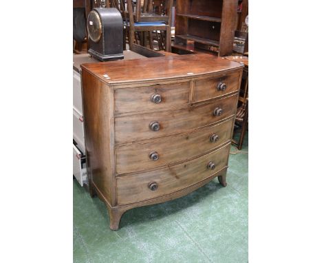 A George III bowfront chest of drawers, two short over three graduated long, spreading bracket feet. 106cm high x 107cm wide 
