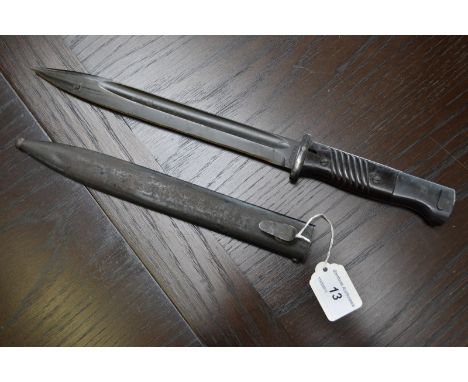 A German bayonet and scabbard, marked F.W. Holler, 3917J