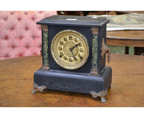 A 19th century faux belge noir mantel clock, c.1880