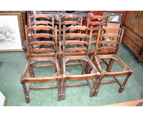 A set of six oak ladder back dining chairs (6)