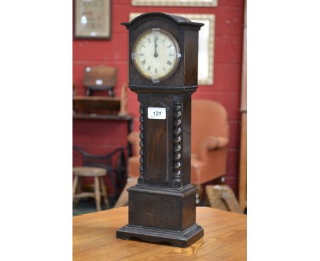 An early 20th century miniature oak longcase clock, cream dial, Roman numerals, manual movement, 44cm high