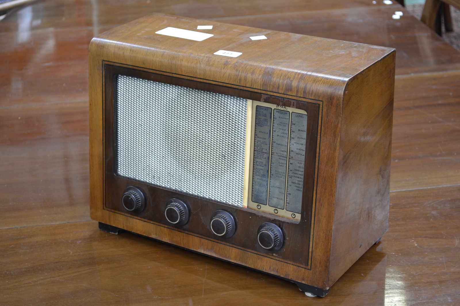 Vintage radio A GEC 5442 walnut cased wireless radio.