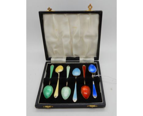 A cased set of six silver and enamel coffee spoons, Birmingham marks Condition Report: Available upon request