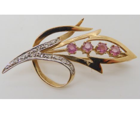 A 9ct gold ruby and diamond brooch length 4.5cm, weight 3.7gms Condition Report: Available upon request