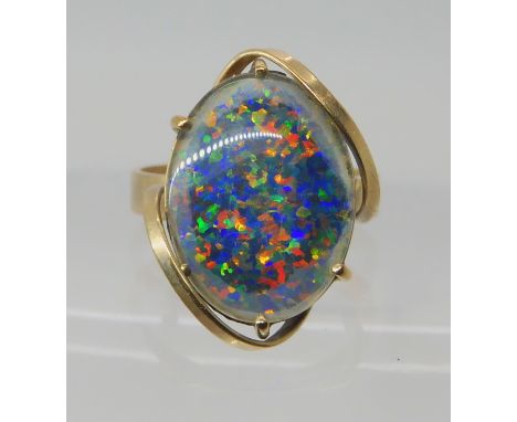 A 9ct gold opal triplet set ring, size N1/2, weight 3.9gms Condition Report: Available upon request