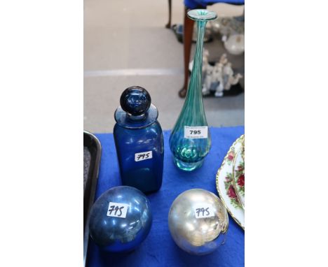 A Jane Charles blown glass vase, two small witches balls and a blue glass decanter Condition Report: Available upon request