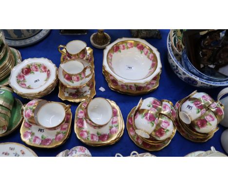 A Royal Albert Old English Rose teaset, pattern no 6241 comprising twelve cups, fourteen saucers, two round side plates, four