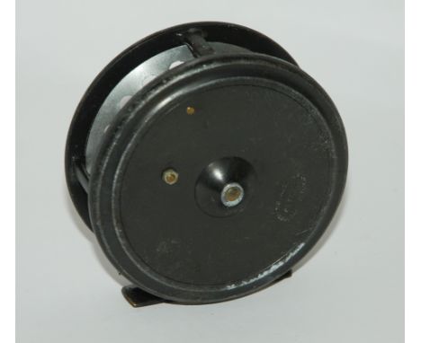 A vintage reel by J.J.S. Walker Bampton, 8.5cm wide, four Wheatly Silmalloy fly cases with flies, hip flask Condition Report:
