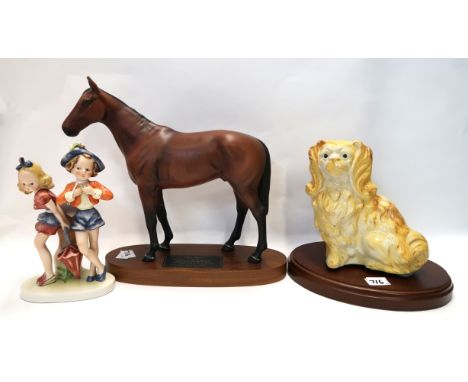 A Goebel figure of two girls, with incised crown mark and no 2, a Beswick Connoisseur model of Mill Reef and a pottery model 