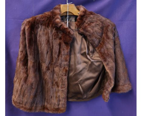 Two brown fur jackets and a print (3) Condition Report: Available upon request