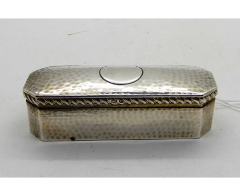 A hammered silver snuff box, Birmingham 1902, rectangular with canted corners, 8cm wide, 46gms Condition Report: OK.