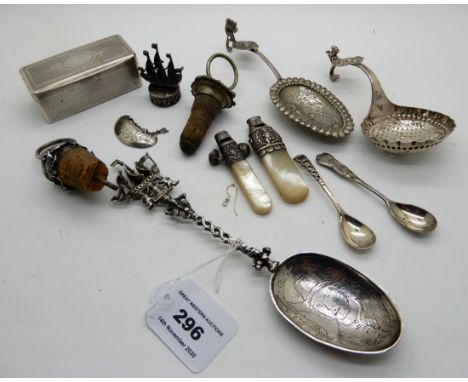 A lot comprising assorted white metal items - part baby rattle, sifter spoon, snuff box, fancy serving spoon etc Condition Re