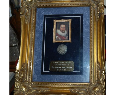 A box of various prints and portrait miniatures including framed King James VI silver shilling etc Condition Report: Availabl