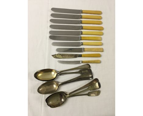 A quantity of mixed knives and spoons to include Walker & Hall.