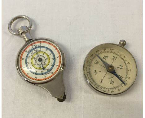 A vintage German double sided chartometer map measuring wheel, scales are inches to miles/centimeters to kilometers on one si