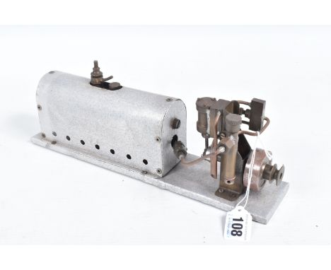 A SINGLE CYLINDER LIVE STEAM ENGINE, horizontal boiler feeding a vertical single cylinder engine driving a  4cm diameter soli