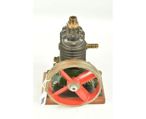 A TWIN CYLINDER COMPRESSOR ENGINE, possibly Stuart Turner but not marked, driving a heavy 11½cm diameter flywheel, not tested