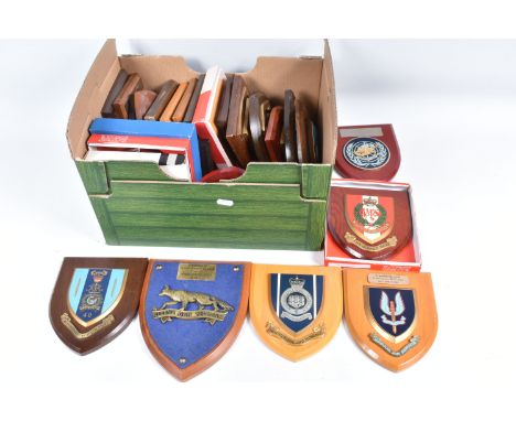 A QUANTITY OF MILITARY WOODEN COMMEMORATIVE WALL PLAQUES, these include united nations, Northumberland Hussars, Queens Dragoo