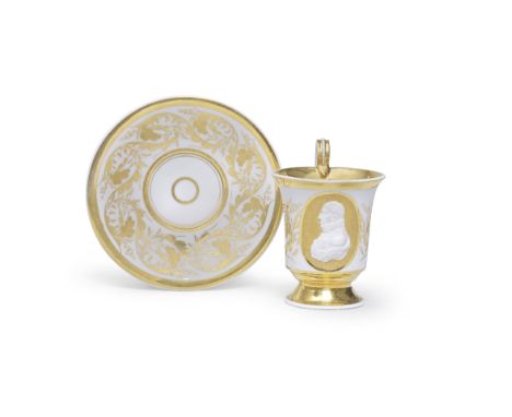 A Berlin portrait cup and saucer, circa 1800-10The bell-shaped cup applied with a biscuit relief profile bust of Alexius Frie