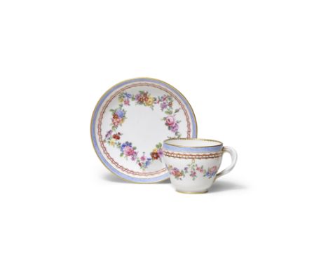 A Sèvres cup and saucer (gobelet Hébert et soucoupe), circa 1773Each decorated with floral swags under a double band intertwi