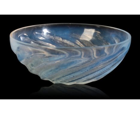 LALIQUE: A 'POISSONS' OPALESCENT GLASS BOWLthe exterior intaglio moulded with spiralling sardines and bubbles, the interior e
