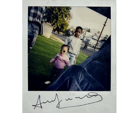 Andy Warhol. Family portrait. Polaroid. Signed "Andy Warhol" in felt pen on the front. Bears the stamp "Andy Warhol Collectio