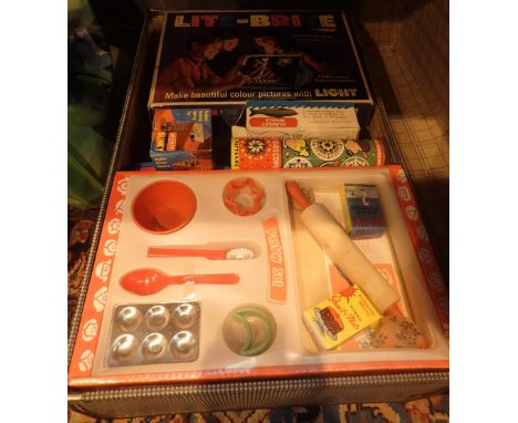 Collection of mixed board games including 1970s space hopper
