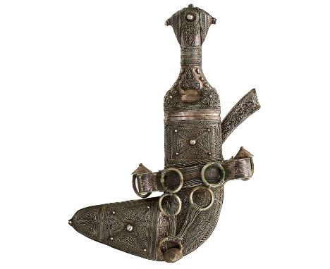 16cm sharply curved blade with raised medial ridge, characteristic white metal hilt finely decorated with flower heads and ge