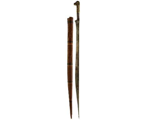 73cm thick section shaped blade tapering to a fine point, chiselled with geometric designs inlaid in brass, characteristic br