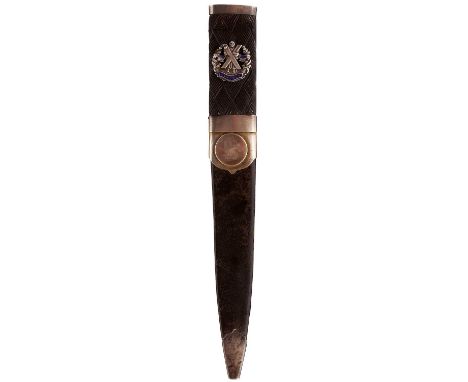 15cm fullered blade double edged towards the tip, white metal mounted hilt, carved basketweave wooden grip applied with a whi