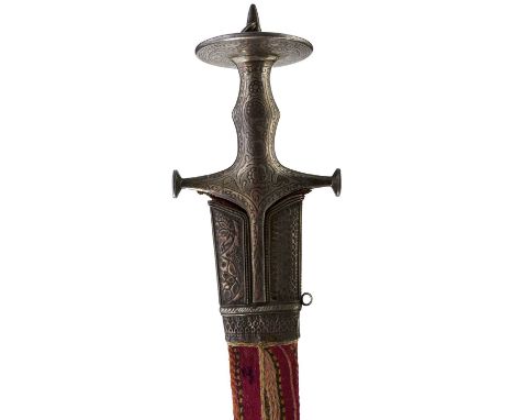 79.5cm curved wootz damascus blade, characteristic hilt with elongated langets, disc terminals to the quillons, large dished 