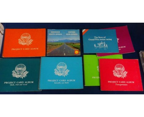 Trade cards, selection of cards contained in 8 Corner Mounted or Stuck in original albums including Shell NZ Project albums (