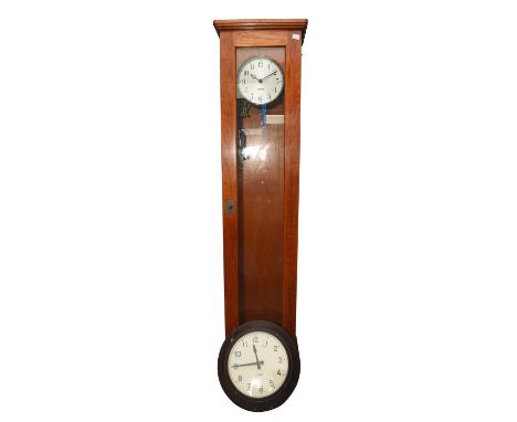 Gent's of Leicester, an oak master clock, silvered dial with Arabic numerals, half minute pulse, with pendulum and instructio