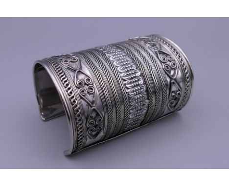 A large cuff bangle. 9 cm long.