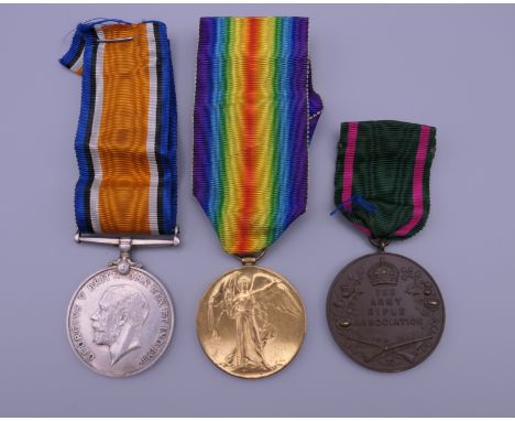 Two WWI Service medal awarded to GS-79373 PTE. G. SWEET R.FUS and an Army Rifle Association medallion. 