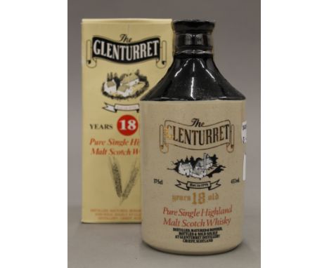 A boxed bottle of Glenturret 18 Year Old Pure Single Highland Malt Scotch Whiskey. 18.5 cm high.