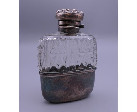 A silver and crystal hip flask. 9.5 cm high.