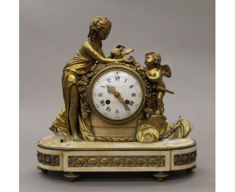 A 19th century ormolu and marble mantle clock. 33 cm high.
