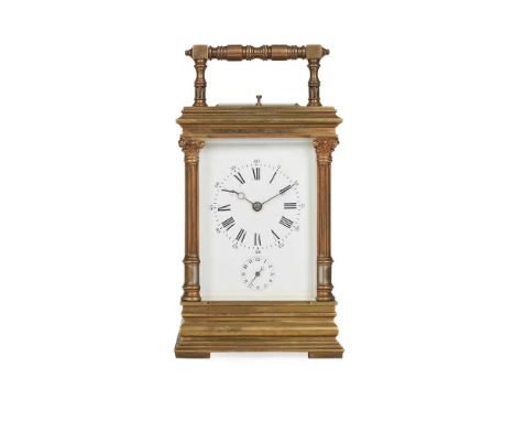 the white enamel dial with Roman numeral hours and Arabic seconds and a subsidiary alarm dial, in a brass and silvered column