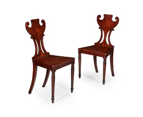 with urn form backs above wide panel seats raised on slender tapered legs48cm wide, 94cm high, 36cm deep