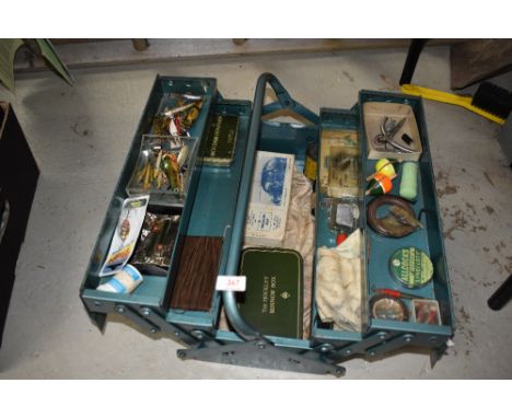 A metal tool box containing vintage fishing tackle, with some interesting pieces worth a look