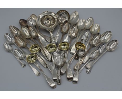 A set of six 19th century bright cut silver teaspoons, Newcastle marks, a matched set of four silver mustard spoons, a silver