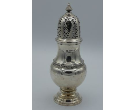 Adie Brothers, a Queen Elizabeth II silver sugar castor of baluster form on a stepped circular foot. Birmingham 1955. 18cm hi