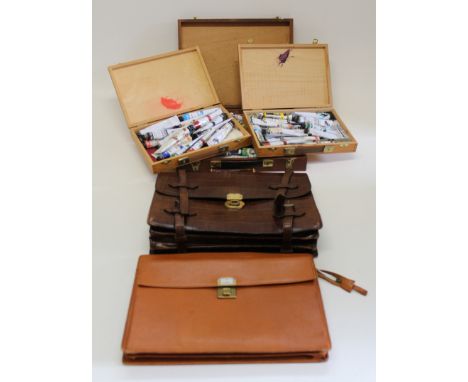 A gentleman's&nbsp; hide brief case by Davidson, 43cm wide, a tan hide briefcase and three un-named artists boxes containing 