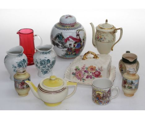 A 1930's Susie Cooper teapot with Leaping deer mark, an Adams Dickensware jug, a Jackson and Gosling coffee pot, 20th century