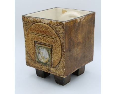 A large Troika cube vase/ jardiniere, raised on four tapered feet. 18cm high