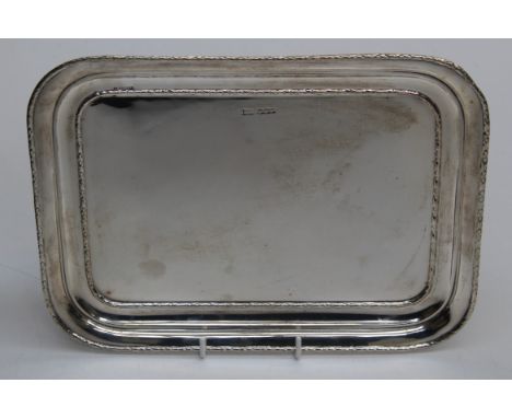 A sterling silver drinks tray by Walker and Hall of Sheffield, 1921. 30 x 225 x 1.5cm. 466gm